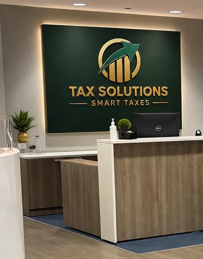Tax Solutions reception at the Datran Center, Miami, with the backlit gold logo